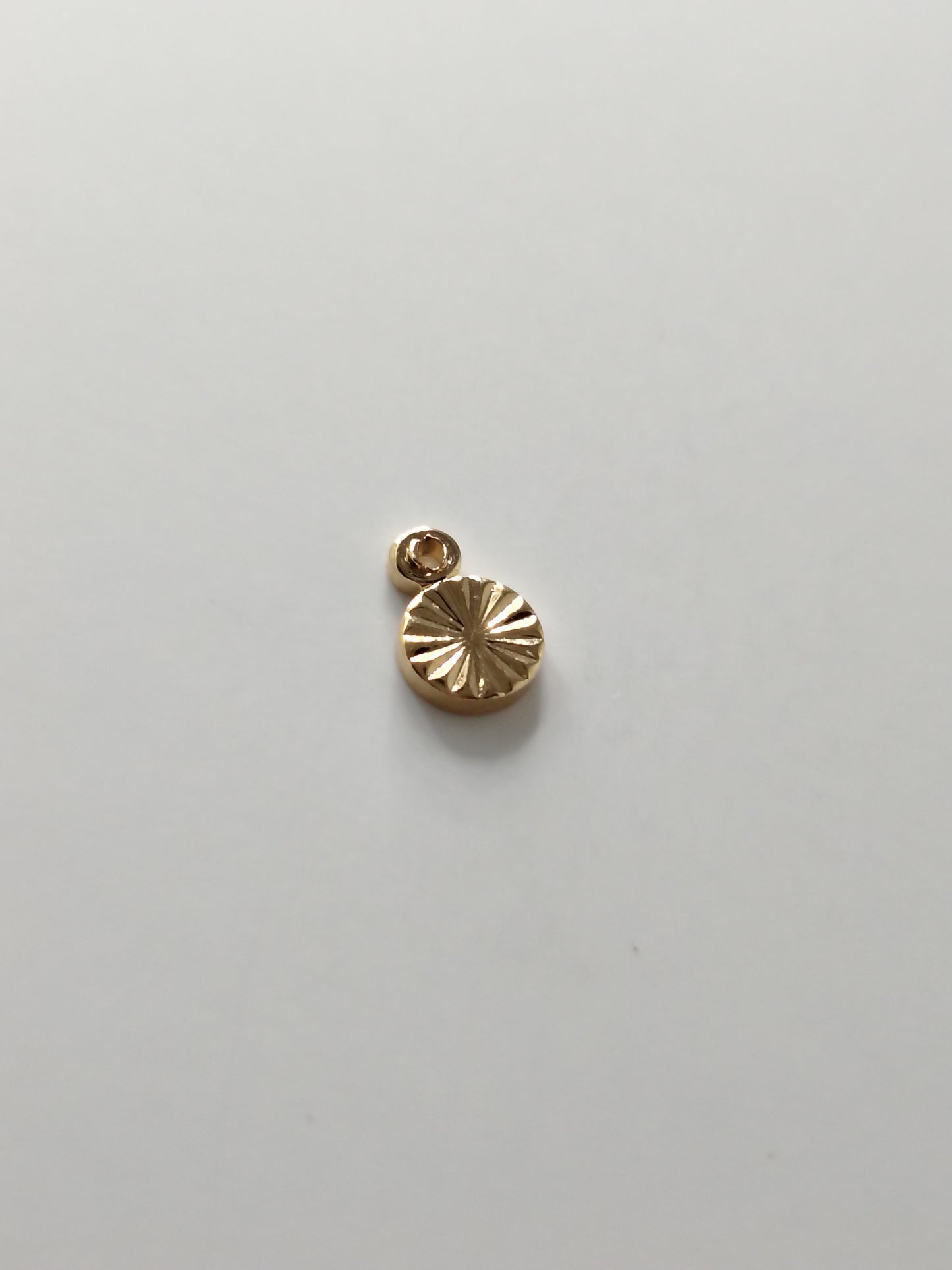 PENDENTIF ROND ECLATS