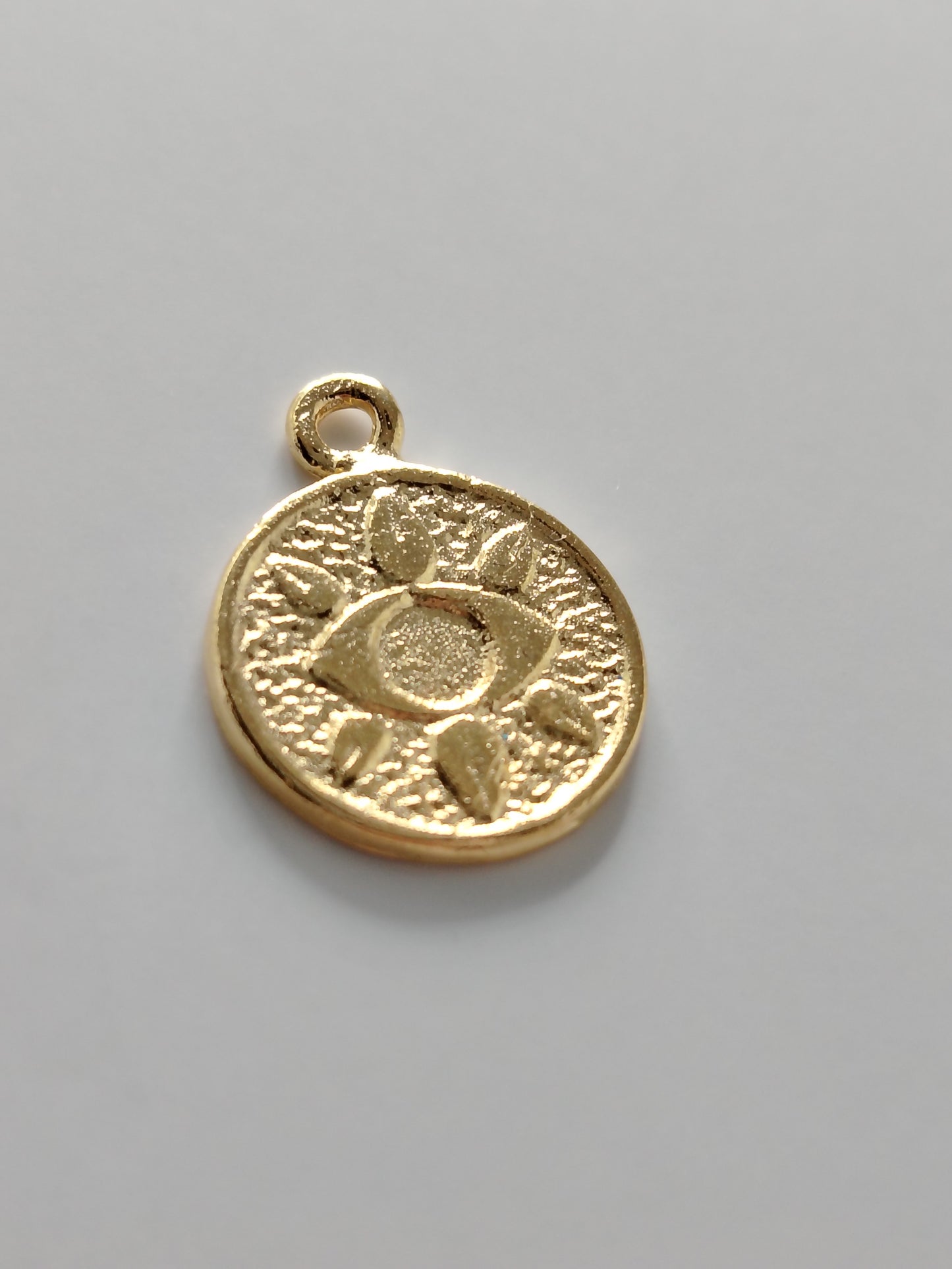 PENDENTIF ROND MOTIF OEIL